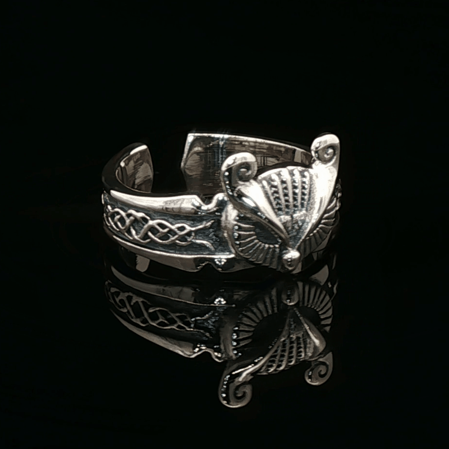 Adjustable Celtic owl ring in sterling silver with detailed knotwork and owl design by Le Dragon Argenté.
