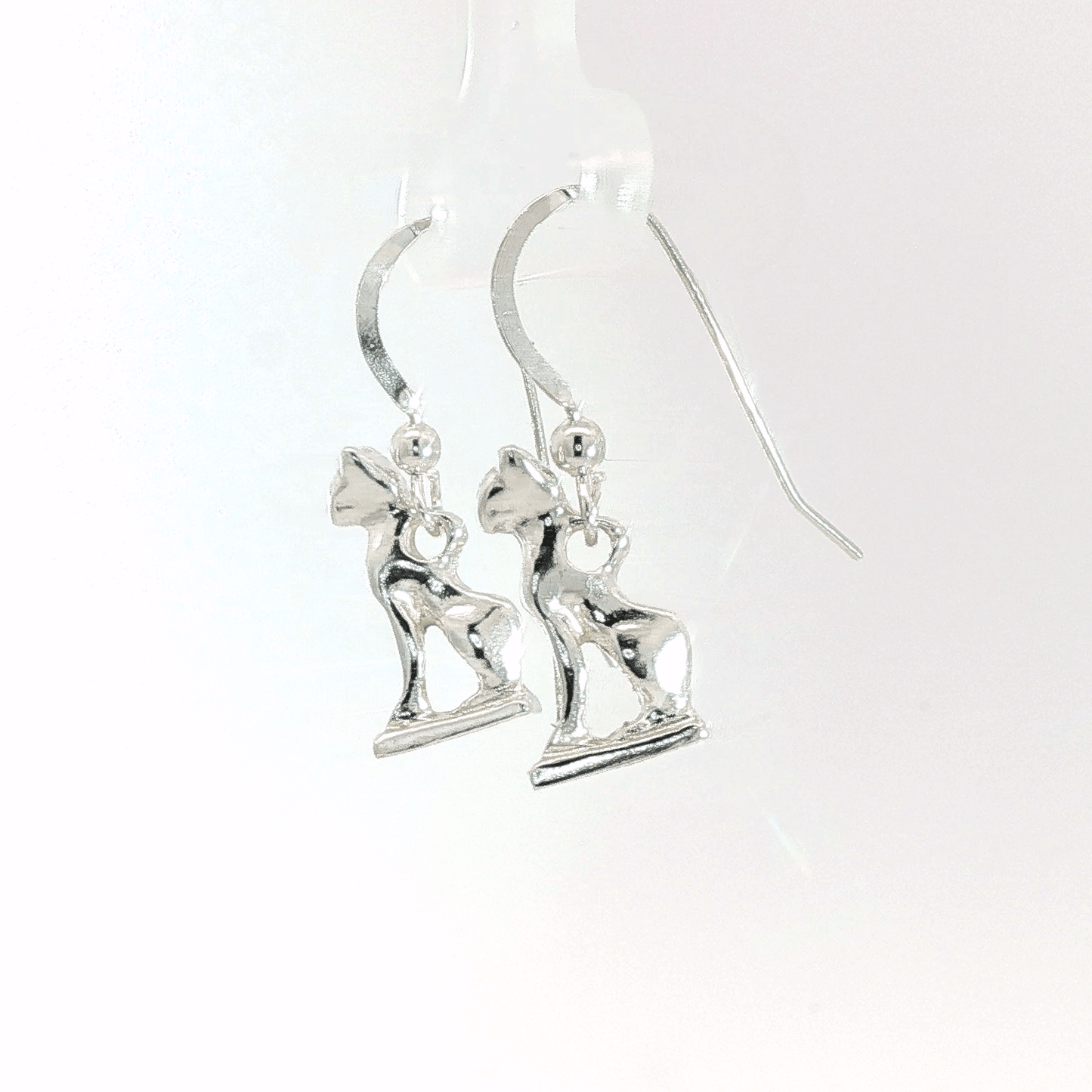 Handcrafted Bastet Cat Charm Earrings in sterling silver, antique bronze, or stainless steel by Le Dragon Argenté. Inspired by the Egyptian goddess Bastet, symbol of protection, joy, and feminine strength. These detailed feline earrings are perfect for mythology lovers, cat enthusiasts, and fans of Egyptian-inspired jewelry with spiritual meaning.