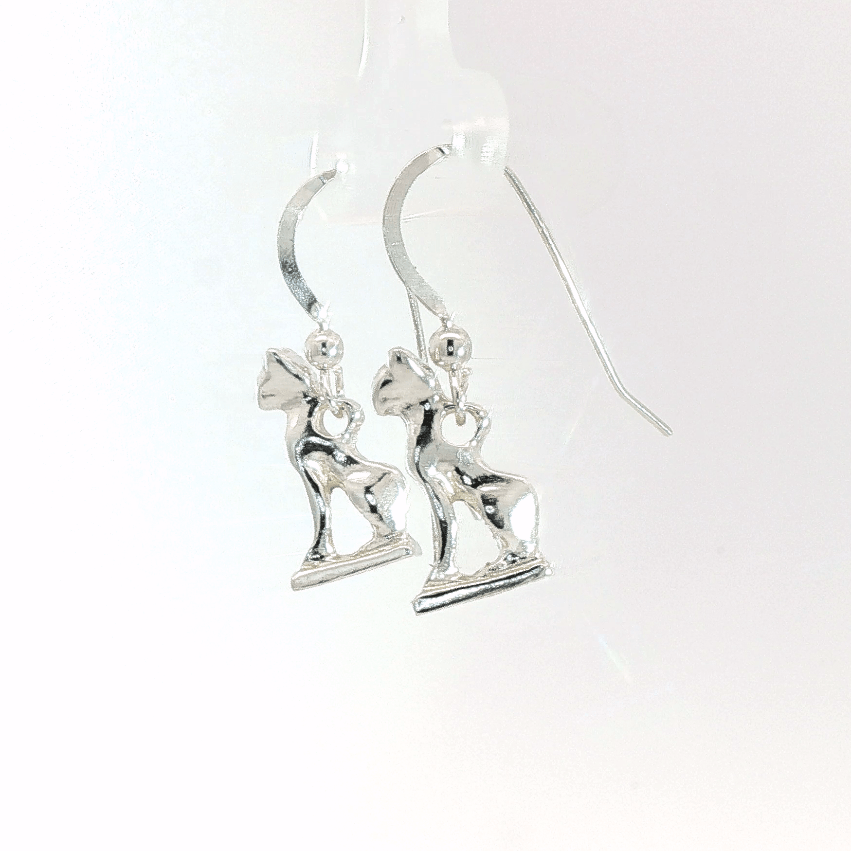 Handcrafted Bastet Cat Charm Earrings in sterling silver, antique bronze, or stainless steel by Le Dragon Argenté. Inspired by the Egyptian goddess Bastet, symbol of protection, joy, and feminine strength. These detailed feline earrings are perfect for mythology lovers, cat enthusiasts, and fans of Egyptian-inspired jewelry with spiritual meaning.