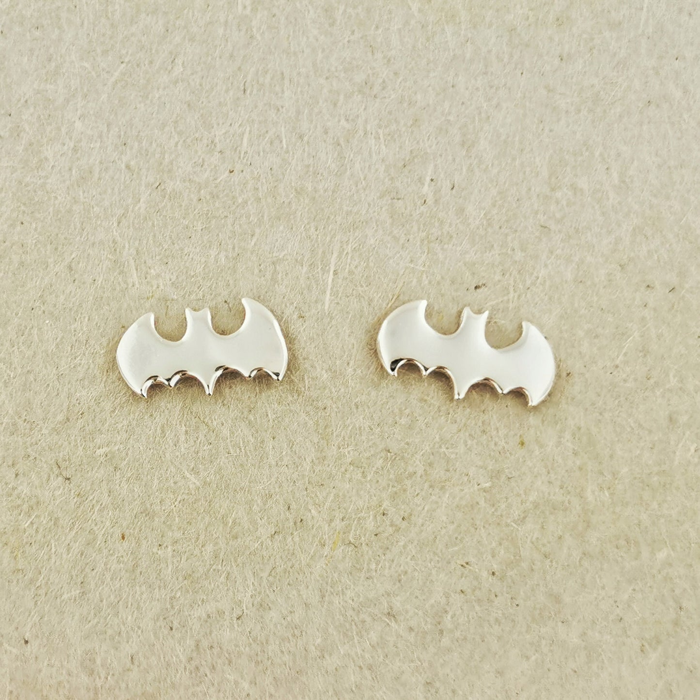 bat stud earrings in silver, sterling silver bat stud earrings, superhero earrings, superhero silver earrings, silver superhero earrings, small silver earrings, small stud earrings, silver stud earrings, geeky stud earrings, geeky silver earrings, geek earrings, sterling silver geek earrings, silver geek jewelry, silver geek jewellery, silver geeky jewelry, silver geeky jewellery