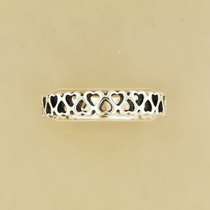 Connected Hearts Band Ring in sterling silver with linked heart design by Le Dragon Argenté