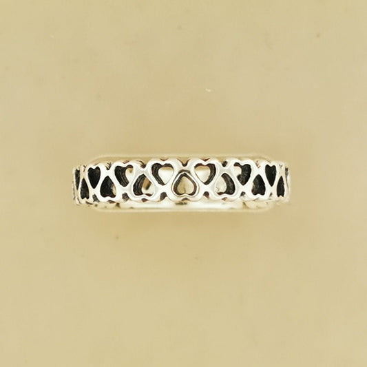 Connected Hearts Band Ring in sterling silver with linked heart design by Le Dragon Argenté