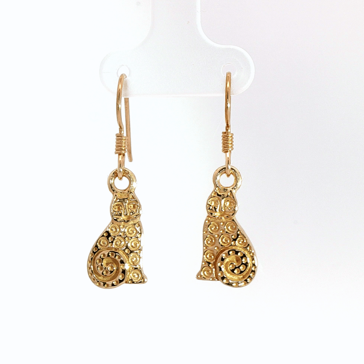 Country style cat charm earrings in antique bronze, rustic feline jewelry, small sitting cat dangle earrings, cottagecore farm aesthetic earrings, minimalist animal lover jewelry for everyday wear by Le Dragon Argenté