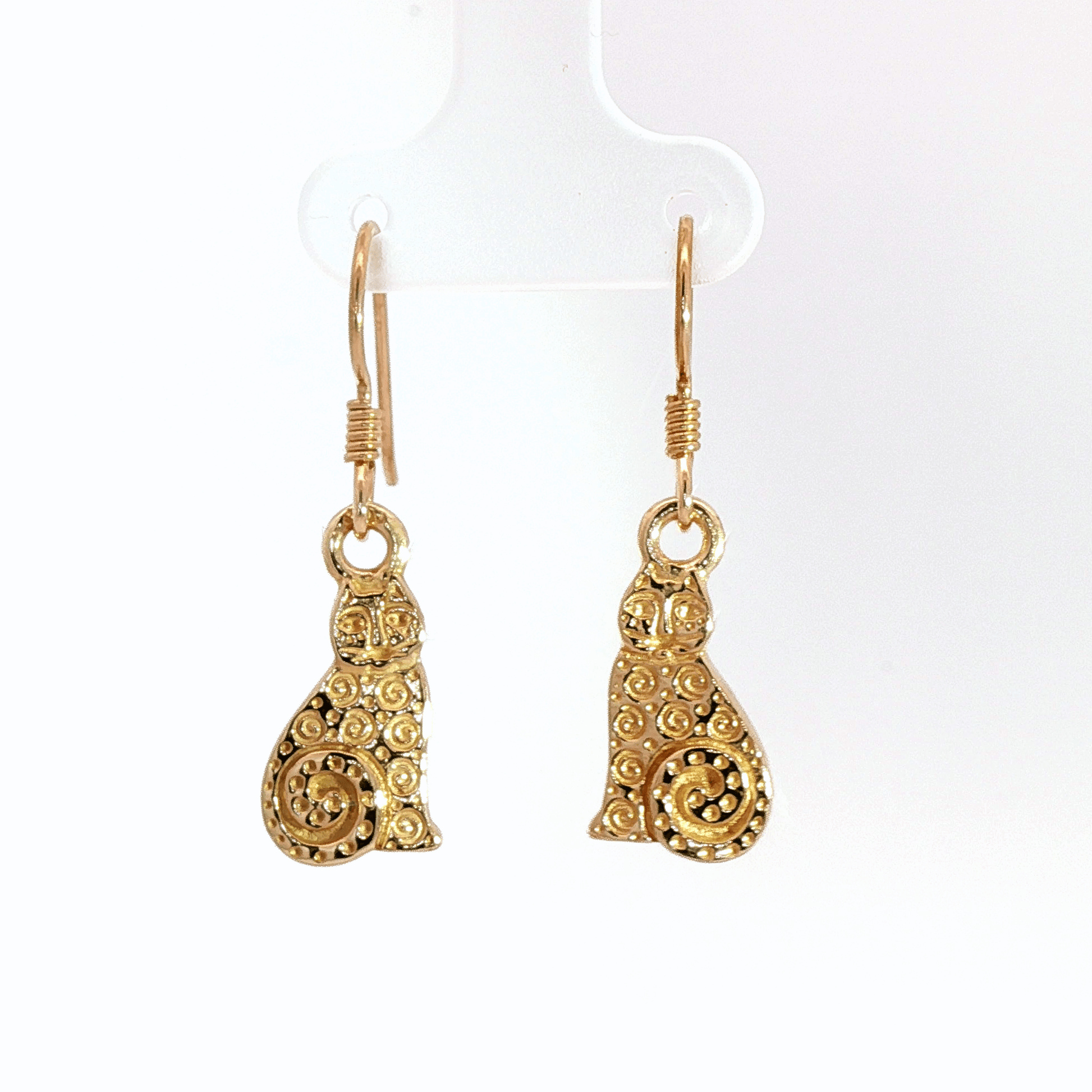 Country style cat charm earrings in antique bronze, rustic feline jewelry, small sitting cat dangle earrings, cottagecore farm aesthetic earrings, minimalist animal lover jewelry for everyday wear by Le Dragon Argenté