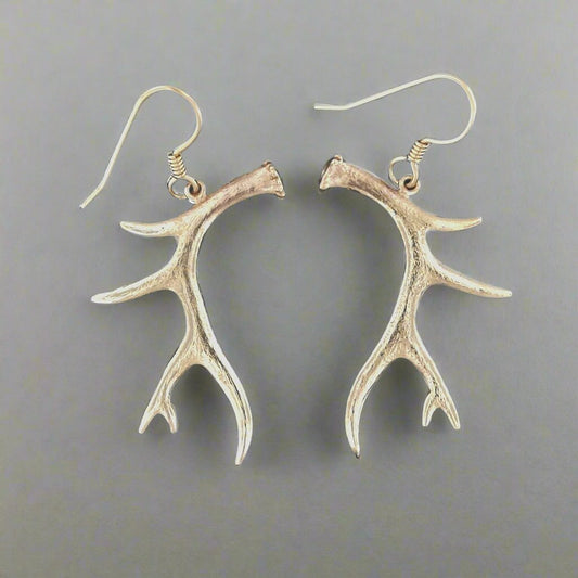 Antique bronze antler earrings rustic woodland style jewelry. Handmade deer antler dangle earrings in antique bronze. Woodland antler dangle earrings rustic bronze jewelry.