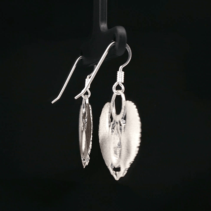 Handmade Winged scarab beetle earrings inspired by ancient Egyptian jewellery, available in sterling silver, antique bronze, or stainless steel. These symbolic scarab talisman earrings represent protection, rebirth, and transformation. A meaningful accessory for mythology lovers, museum enthusiasts, and those who enjoy unique handcrafted historical-style jewellery.