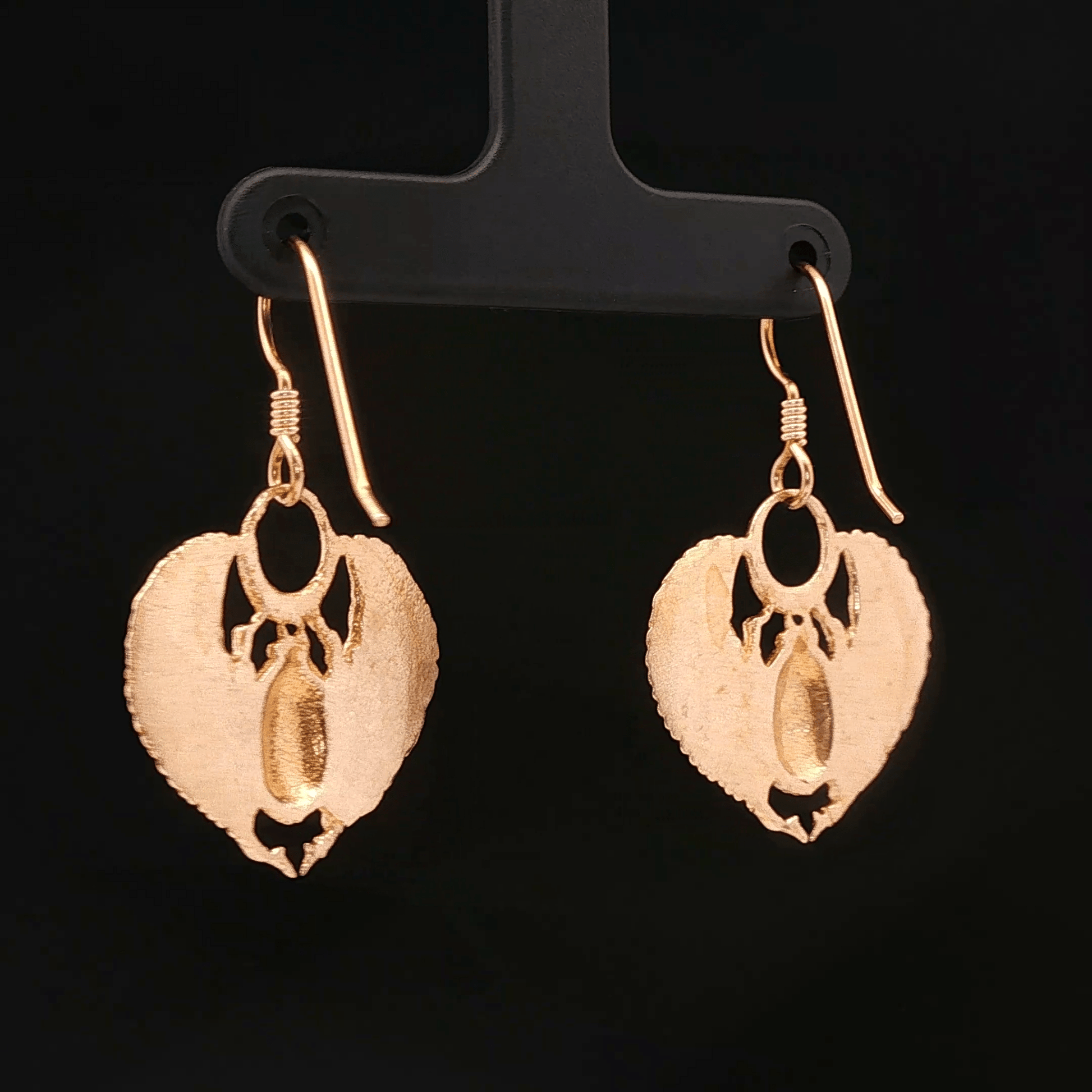 Handmade Winged scarab beetle earrings inspired by ancient Egyptian jewellery, available in sterling silver, antique bronze, or stainless steel. These symbolic scarab talisman earrings represent protection, rebirth, and transformation. A meaningful accessory for mythology lovers, museum enthusiasts, and those who enjoy unique handcrafted historical-style jewellery.