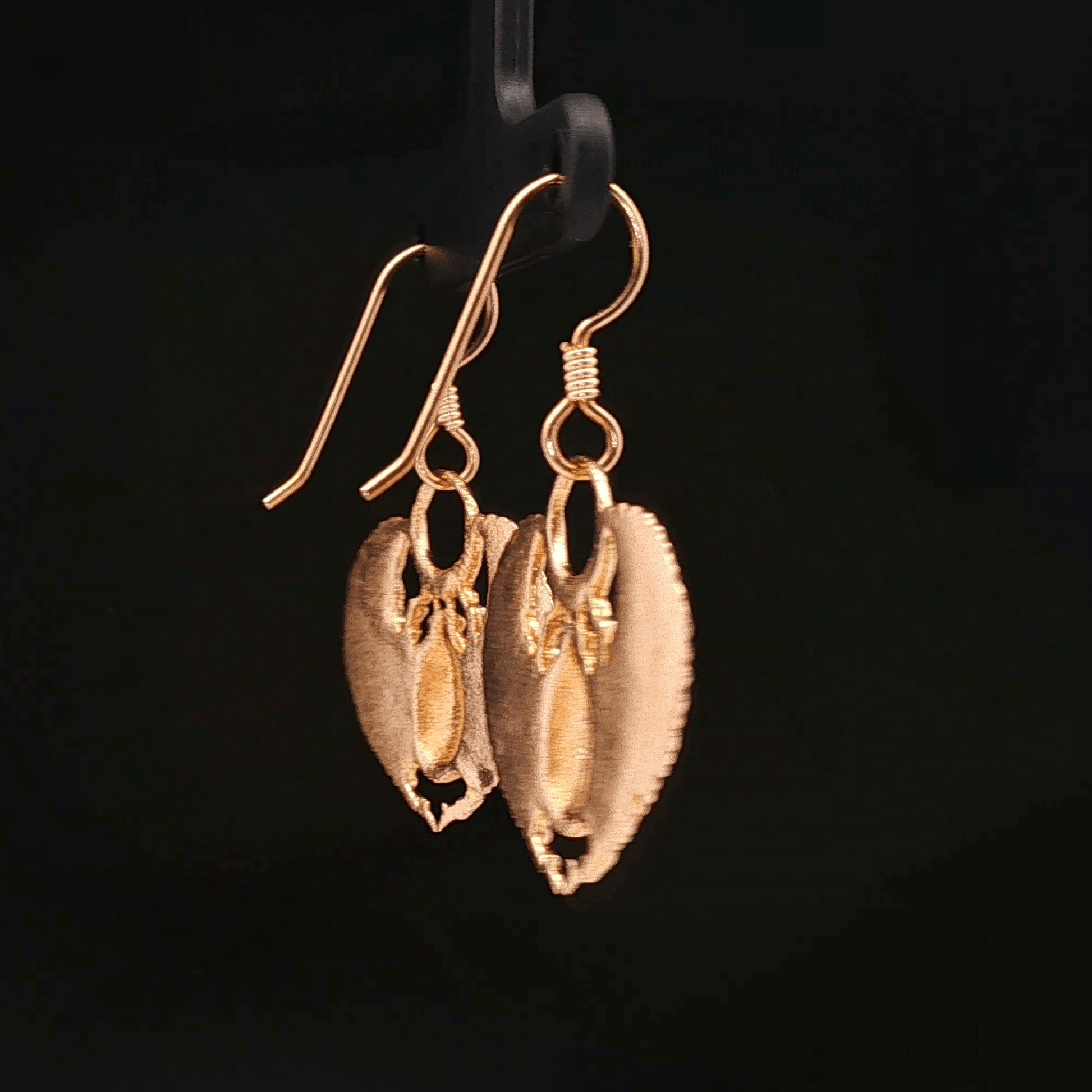 Handmade Winged scarab beetle earrings inspired by ancient Egyptian jewellery, available in sterling silver, antique bronze, or stainless steel. These symbolic scarab talisman earrings represent protection, rebirth, and transformation. A meaningful accessory for mythology lovers, museum enthusiasts, and those who enjoy unique handcrafted historical-style jewellery.