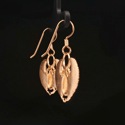 Handmade Winged scarab beetle earrings inspired by ancient Egyptian jewellery, available in sterling silver, antique bronze, or stainless steel. These symbolic scarab talisman earrings represent protection, rebirth, and transformation. A meaningful accessory for mythology lovers, museum enthusiasts, and those who enjoy unique handcrafted historical-style jewellery.