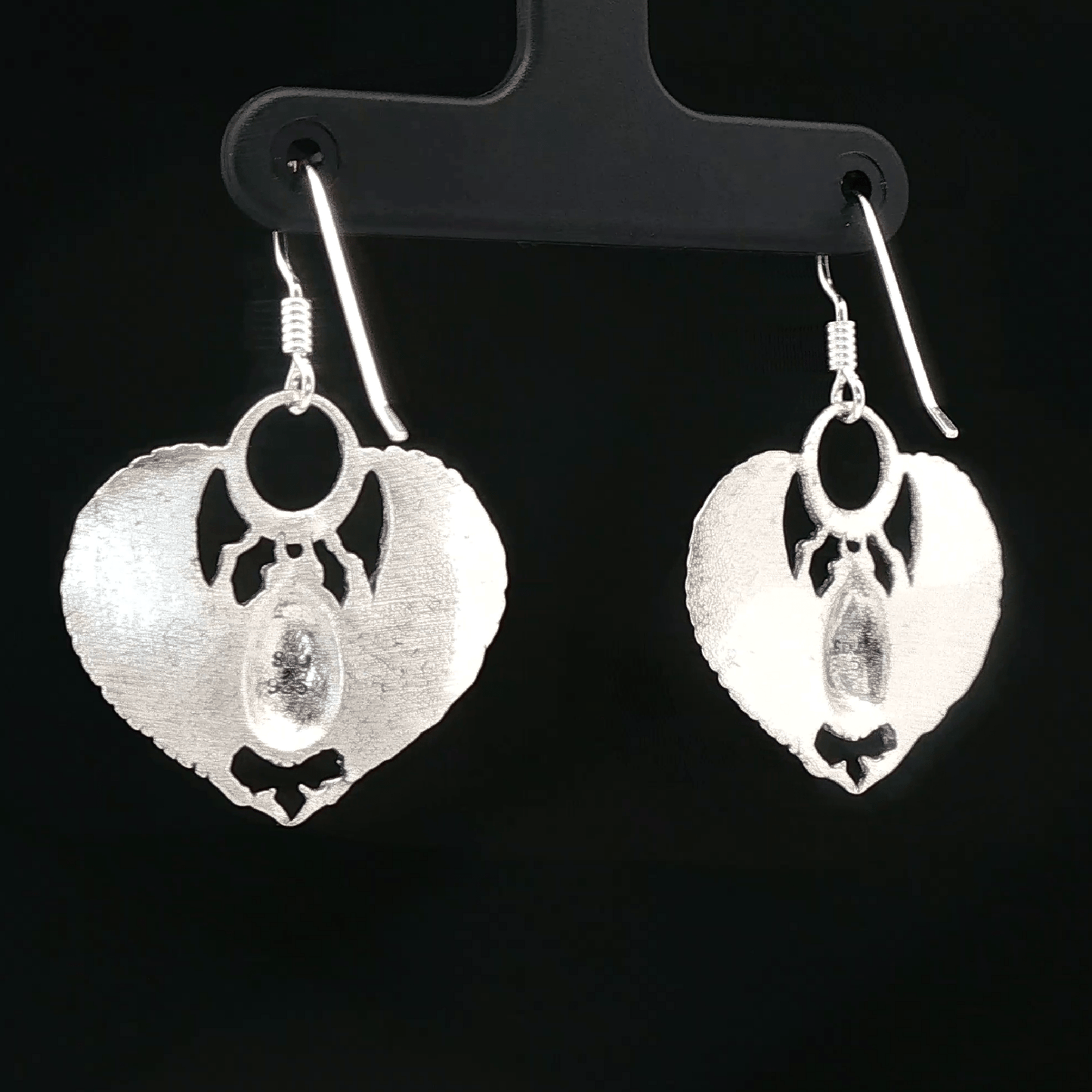 Handmade Winged scarab beetle earrings inspired by ancient Egyptian jewellery, available in sterling silver, antique bronze, or stainless steel. These symbolic scarab talisman earrings represent protection, rebirth, and transformation. A meaningful accessory for mythology lovers, museum enthusiasts, and those who enjoy unique handcrafted historical-style jewellery.