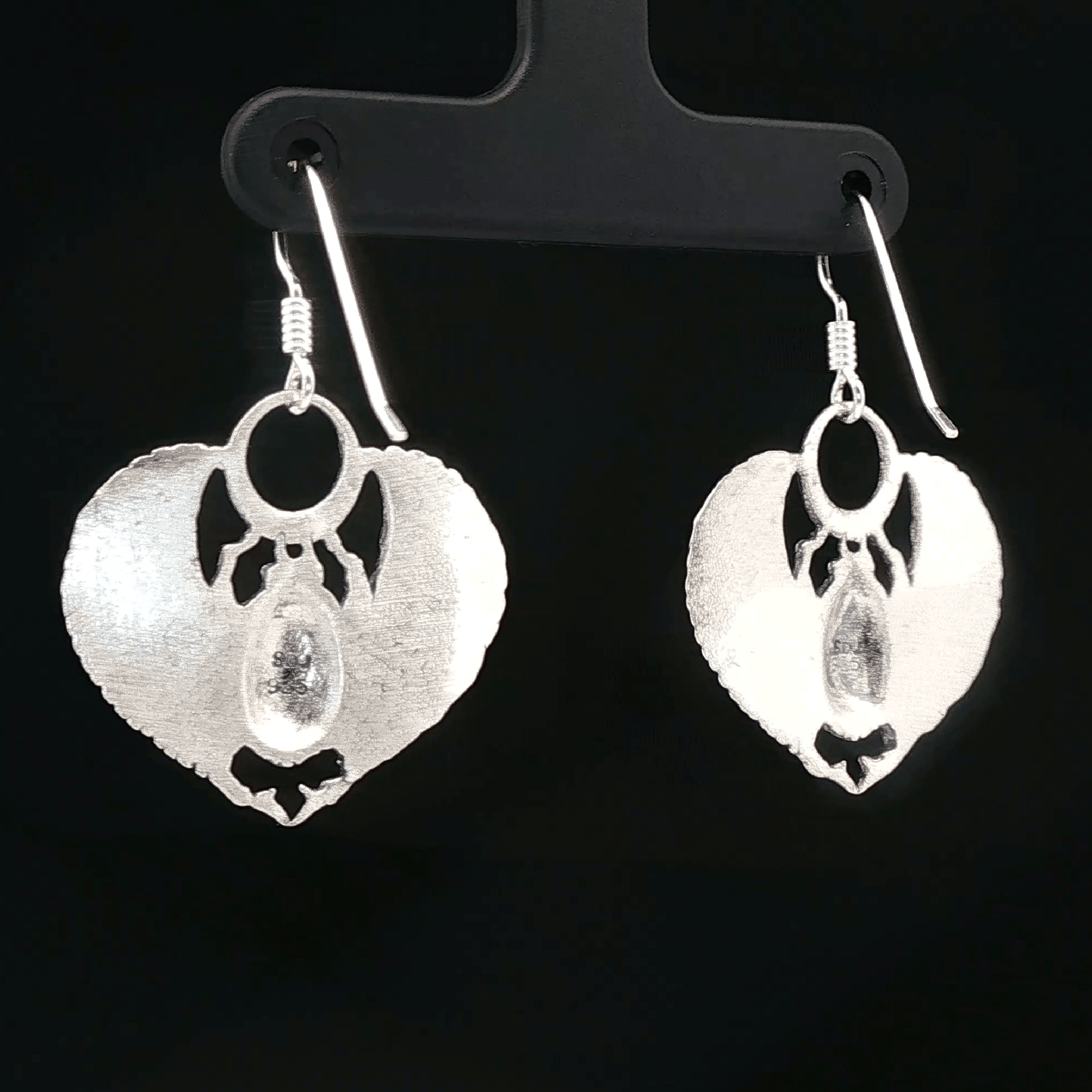 Handmade Winged scarab beetle earrings inspired by ancient Egyptian jewellery, available in sterling silver, antique bronze, or stainless steel. These symbolic scarab talisman earrings represent protection, rebirth, and transformation. A meaningful accessory for mythology lovers, museum enthusiasts, and those who enjoy unique handcrafted historical-style jewellery.