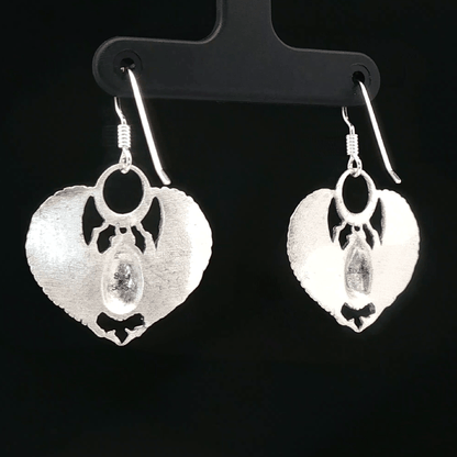 Handmade Winged scarab beetle earrings inspired by ancient Egyptian jewellery, available in sterling silver, antique bronze, or stainless steel. These symbolic scarab talisman earrings represent protection, rebirth, and transformation. A meaningful accessory for mythology lovers, museum enthusiasts, and those who enjoy unique handcrafted historical-style jewellery.