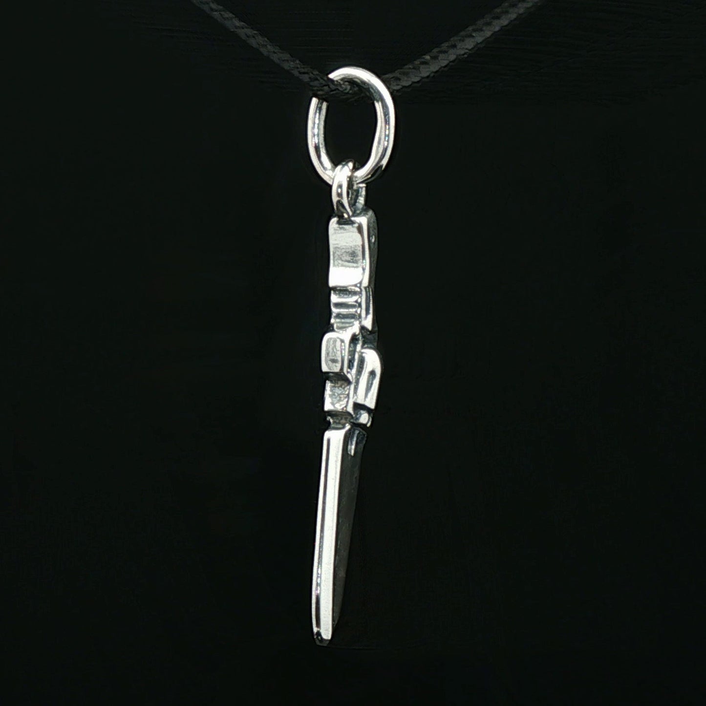 Final Fantasy 8 Gunblade charm pendant in stainless steel geeky jewellery by Le Dragon Argenté