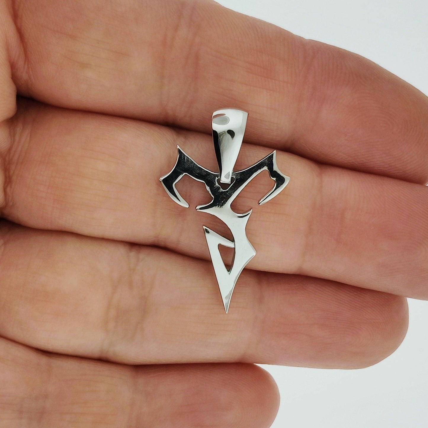 Final Fantasy X Tidus Charm Pendant - Le Dragon Argenté