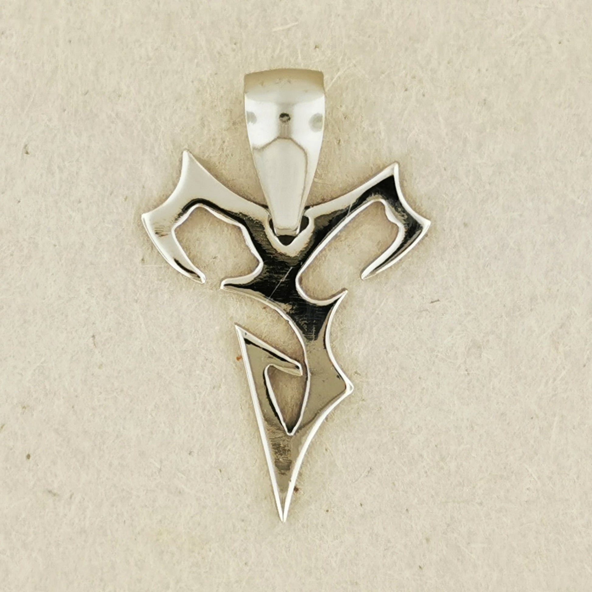 Final Fantasy X Tidus Charm Pendant - Le Dragon Argenté