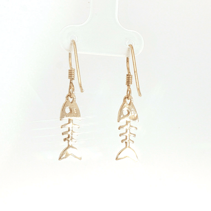 Fishbone charm earrings in antique bronze, quirky ocean jewelry, small fish skeleton dangle earrings, nautical themed animal jewelry, minimalist beach inspired earrings with playful aesthetic by Le Dragon Argenté