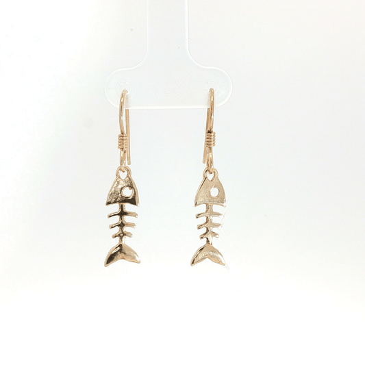 Fishbone charm earrings in antique bronze, quirky ocean jewelry, small fish skeleton dangle earrings, nautical themed animal jewelry, minimalist beach inspired earrings with playful aesthetic by Le Dragon Argenté