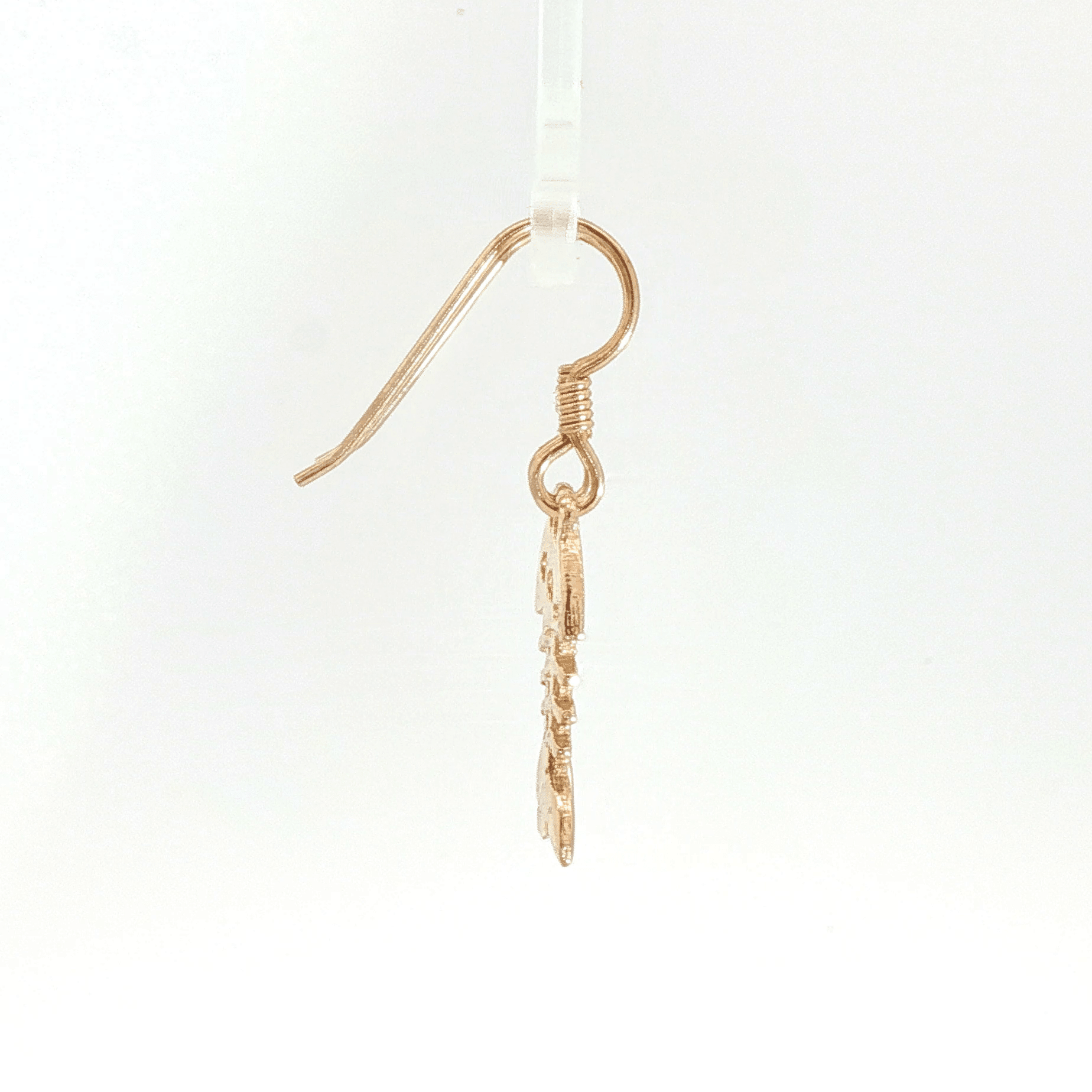 Fishbone charm earrings in antique bronze, quirky ocean jewelry, small fish skeleton dangle earrings, nautical themed animal jewelry, minimalist beach inspired earrings with playful aesthetic by Le Dragon Argenté