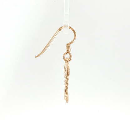 Fishbone charm earrings in antique bronze, quirky ocean jewelry, small fish skeleton dangle earrings, nautical themed animal jewelry, minimalist beach inspired earrings with playful aesthetic by Le Dragon Argenté