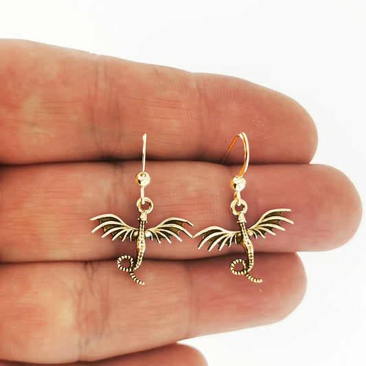 flying dragon charm earrings in gold made to order, flying dragon gold earrings, gold dragon earrings, gold dragon jewelry, gold dragon jewellery, flying dragon earrings, small dragon earrings, small gold dragon earrings, golden dragon earrings, small dragon dangle earrings, gold dangle earrings