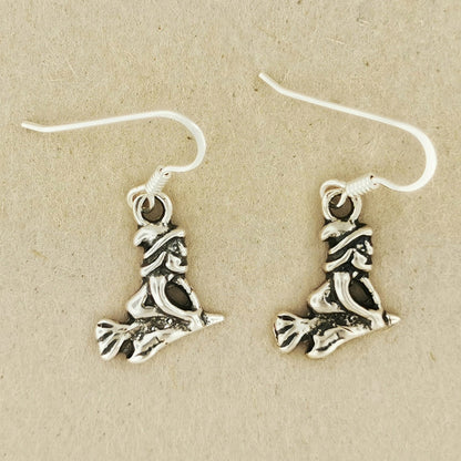 flying witches charm earrings, flying witch earrings, witchy earrings in silver, sterling silver witch earrings, silver pagan earrings, sterling silver witch earrings, witches flying on broom earrings, esoteric silver earrings, silver charm earrings, halloween earrings, halloween jewellery, goth earrings, gothic earrings, silver goth earrings, witch jewellery, witch jewelry