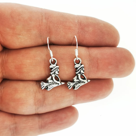 flying witches charm earrings, flying witch earrings, witchy earrings in silver, sterling silver witch earrings, silver pagan earrings, sterling silver witch earrings, witches flying on broom earrings, esoteric silver earrings, silver charm earrings, halloween earrings, halloween jewellery, goth earrings, gothic earrings, silver goth earrings, witch jewellery, witch jewelry