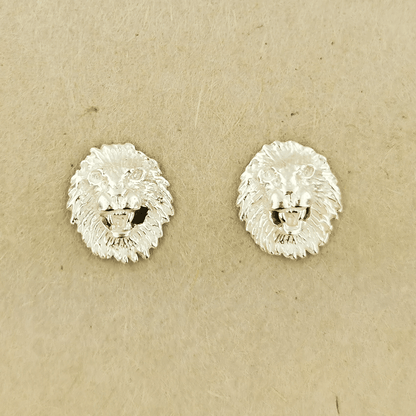 Made-to-order lion head studs by Le Dragon Argenté in solid gold, available in white, pink, or yellow gold and 10k, 14k, or 18k options.