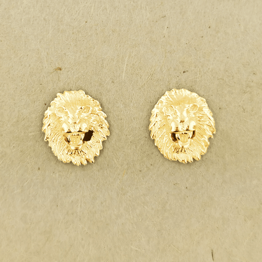 Made-to-order lion head studs by Le Dragon Argenté in solid gold, available in white, pink, or yellow gold and 10k, 14k, or 18k options.