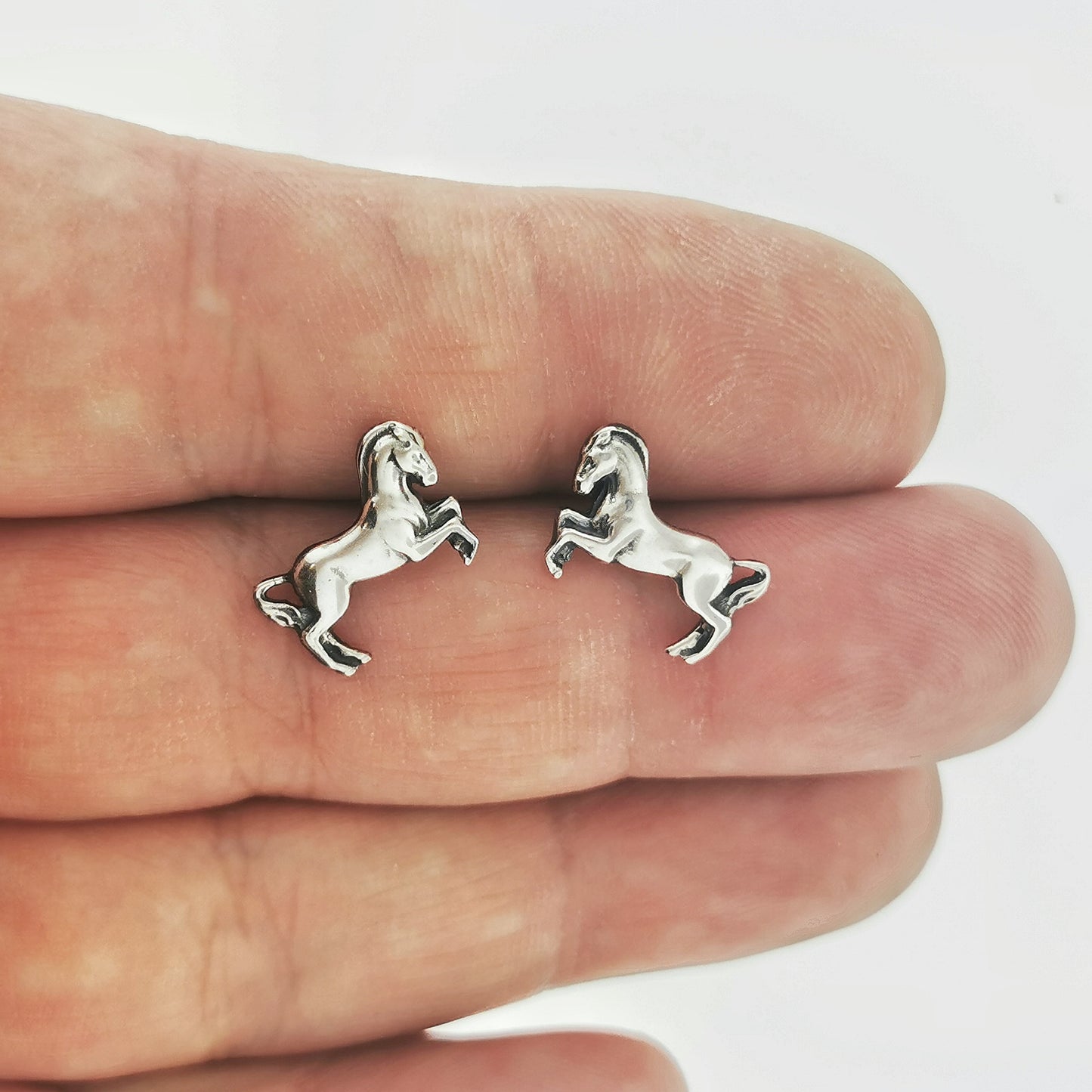 horse stud earrings, silver horse earrings, silver horse studs, silver horse stud earrings, horse jewelry, horse jewellery, horse earrings, small horse earrings, small horse studs, horse lover earrings, horse lover jewelry, horse lover jewellery, silver animal earrings, equestrian earrings, silver equestrian earrings, bucking mare earrings, small silver studs, small stud earrings, sterling silver studs, second hole earrings