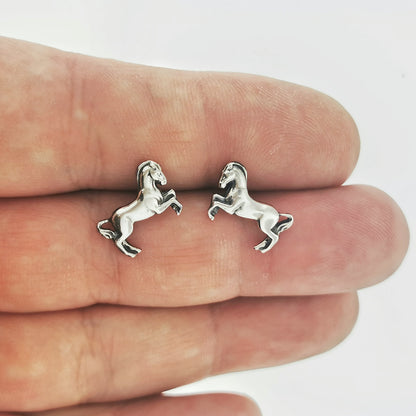 horse stud earrings, silver horse earrings, silver horse studs, silver horse stud earrings, horse jewelry, horse jewellery, horse earrings, small horse earrings, small horse studs, horse lover earrings, horse lover jewelry, horse lover jewellery, silver animal earrings, equestrian earrings, silver equestrian earrings, bucking mare earrings, small silver studs, small stud earrings, sterling silver studs, second hole earrings