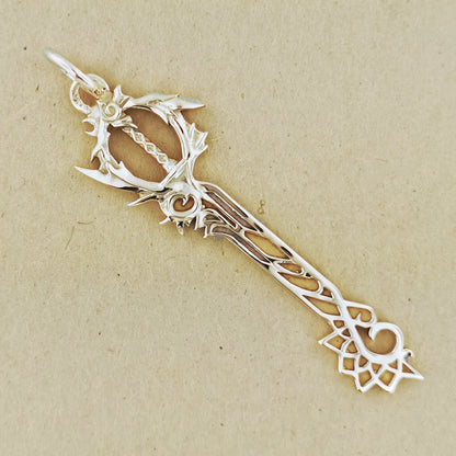 Kingdom Hearts Combined Keyblade Pendant in Gold - Le Dragon Argenté