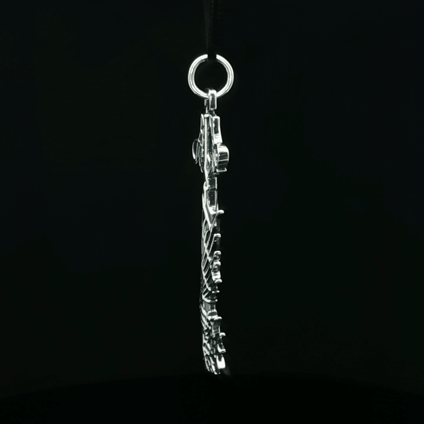 Stainless steel Ultima Keyblade pendant inspired by Kingdom Hearts, detailed gamer necklace with iconic fantasy weapon design by Le Dragon Argenté