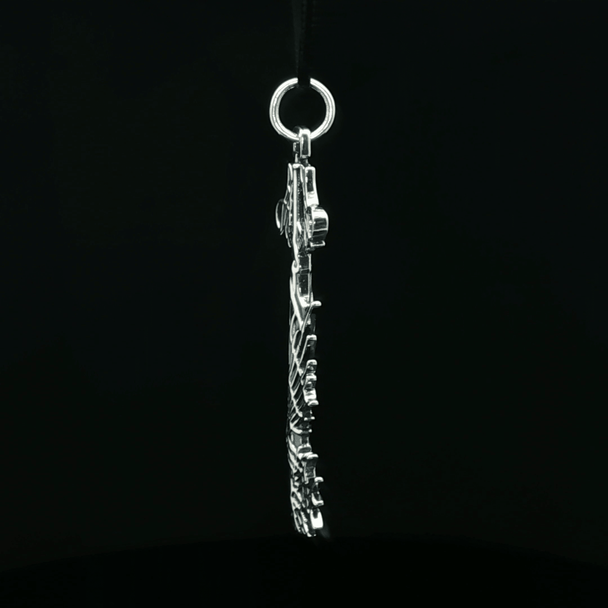 Stainless steel Ultima Keyblade pendant inspired by Kingdom Hearts, detailed gamer necklace with iconic fantasy weapon design by Le Dragon Argenté