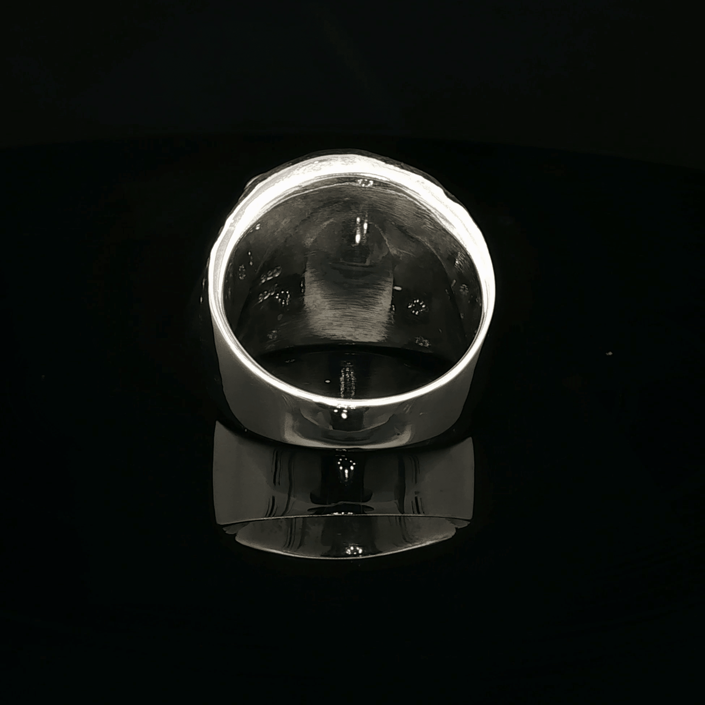 Large owl signet ring in sterling silver with detailed owl face design by Le Dragon Argenté.