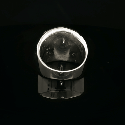 Large owl signet ring in sterling silver with detailed owl face design by Le Dragon Argenté.