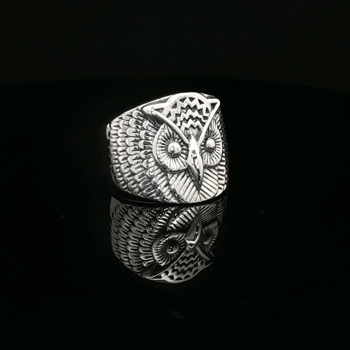 Large owl signet ring in sterling silver with detailed owl face design by Le Dragon Argenté.