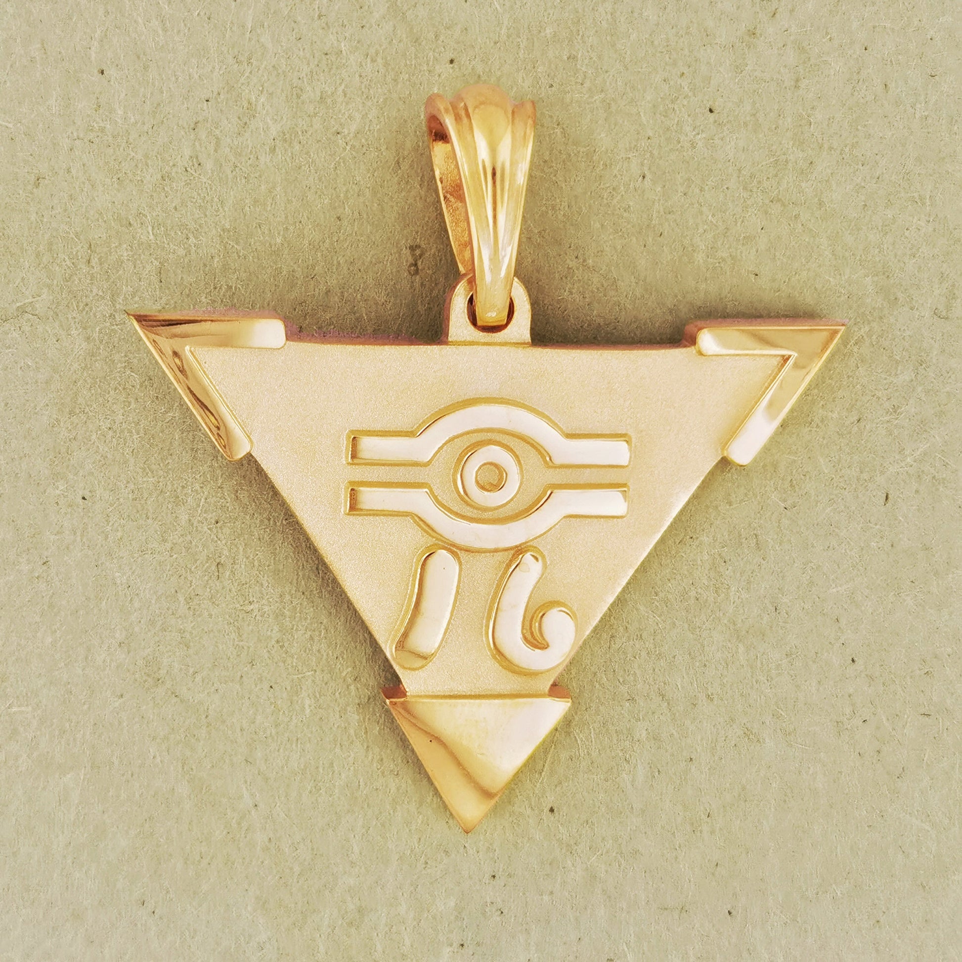 large Yugi-Oh pendant in gold, gold yugi-oh pendant, gold anime pendant, gold anime jewelry, gold anime jewellery, gold eye pendant, gold egyptian pendant, gold triangle pendant, geeky gold jewelry, geeky gold pendant, gold geek jewelry, gold geeky jewellery, gold geek pendant