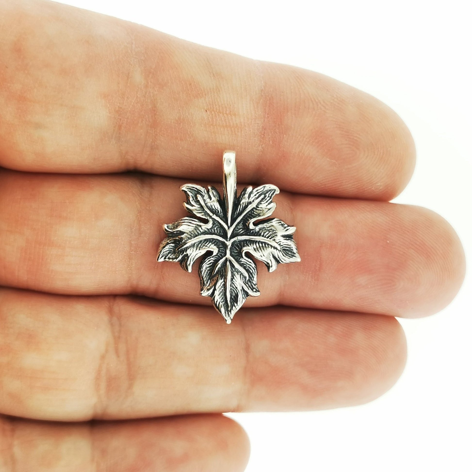 Maple leaf charm pendant in sterling silver perfect for Canada lovers