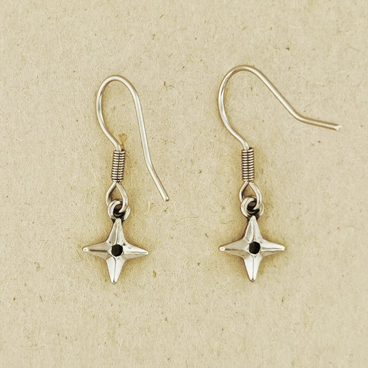 Ninja Shuriken Throwing Star charm earrings inspired by Japanese ninja weapons and anime cosplay. Available in .925 sterling silver, antique bronze, and stainless steel options. Handcrafted dangle earrings for gamers, anime lovers, and geeks who love unique Japanese-inspired accessories. Stylish gift for cosplay or everyday wear.
