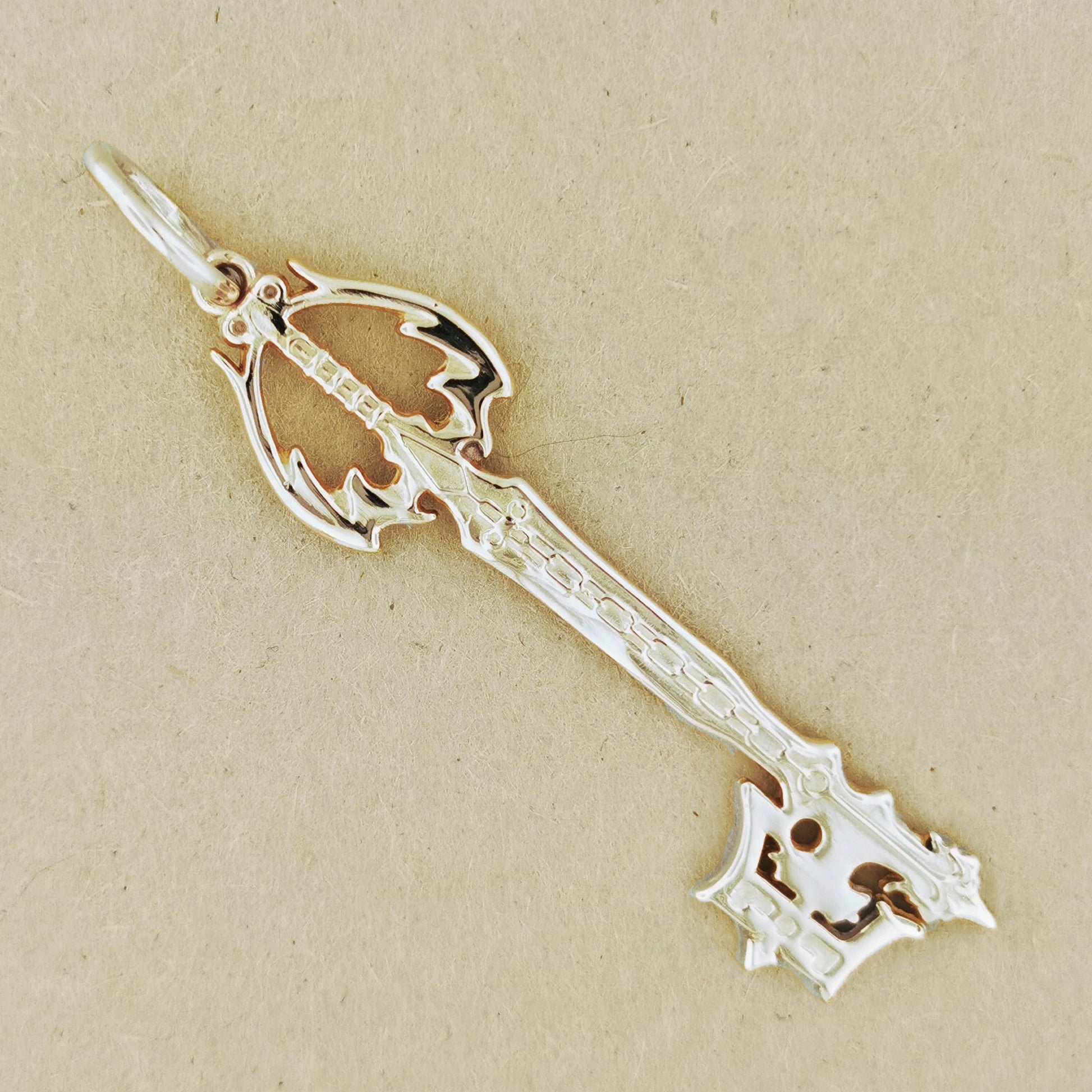 Kingdom Hearts Oblivion Keyblade Pendant in White Gold, KH Keyblade Pendant, Gold Video Game Pendant, Gold Oblivion keyblade pendant, gold kingdom hearts jewelry, gold kingdom hearts pendant, kingdom hearts cosplay, video game jewelry, video game pendant, gold keyblade, gold keyblade pendant