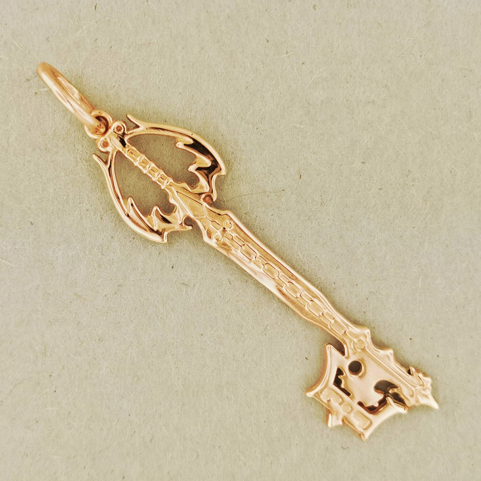 Kingdom Hearts Oblivion Keyblade Pendant in Pink Gold, KH Keyblade Pendant, Gold Video Game Pendant, Gold Oblivion keyblade pendant, gold kingdom hearts jewelry, gold kingdom hearts pendant, kingdom hearts cosplay, video game jewelry, video game pendant, gold keyblade, gold keyblade pendant