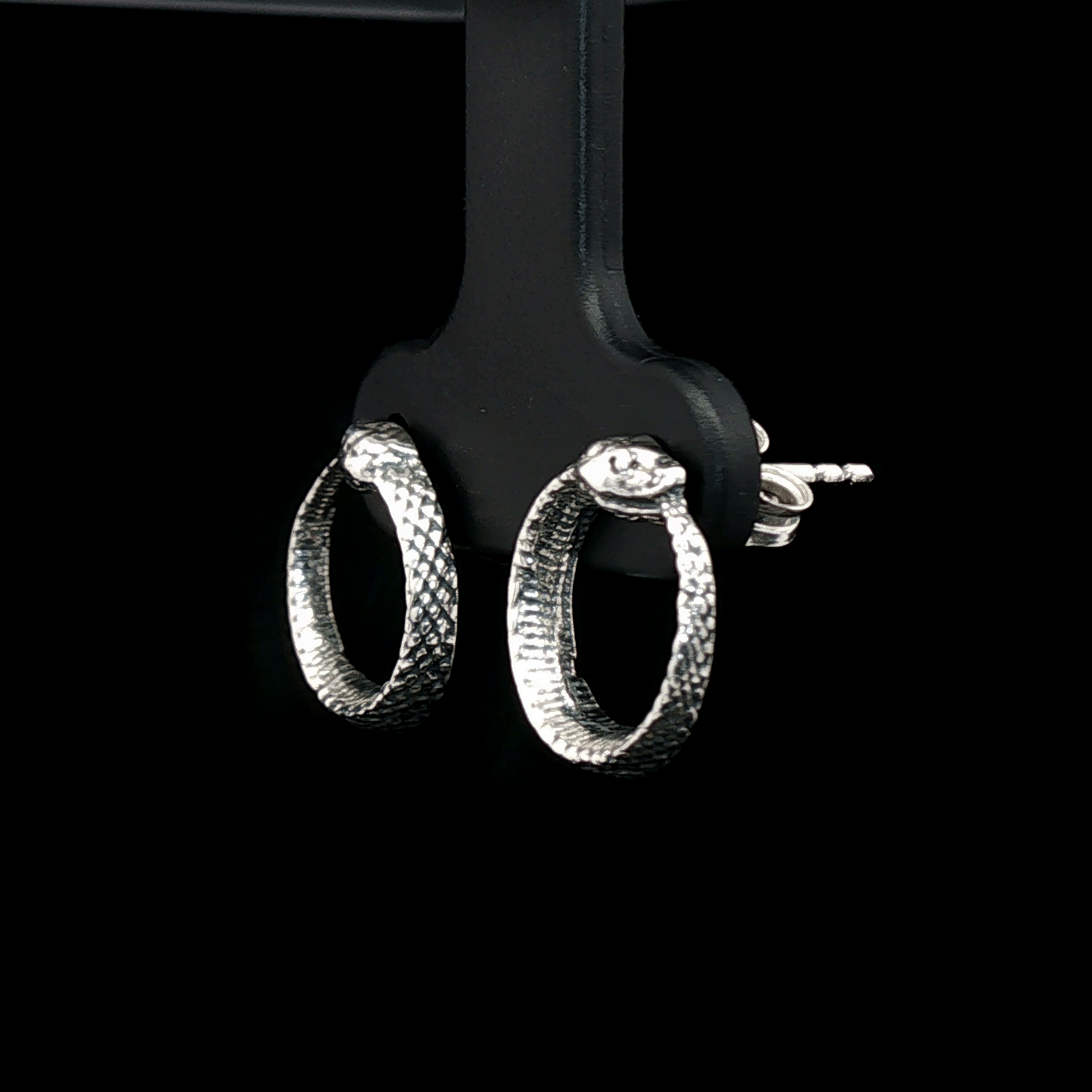 Ouroboros Stud Earrings in Sterling Silver by Le Dragon Argenté – symbolic serpent design representing infinity, rebirth, and ancient myth in a sleek, handcrafted style.