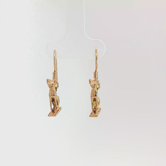 Handcrafted Bastet Cat Charm Earrings in antique bronze by Le Dragon Argenté. Inspired by the Egyptian goddess Bastet, symbol of protection, joy, and feminine strength. These detailed feline earrings are perfect for mythology lovers, cat enthusiasts, and fans of Egyptian-inspired jewelry with spiritual meaning.