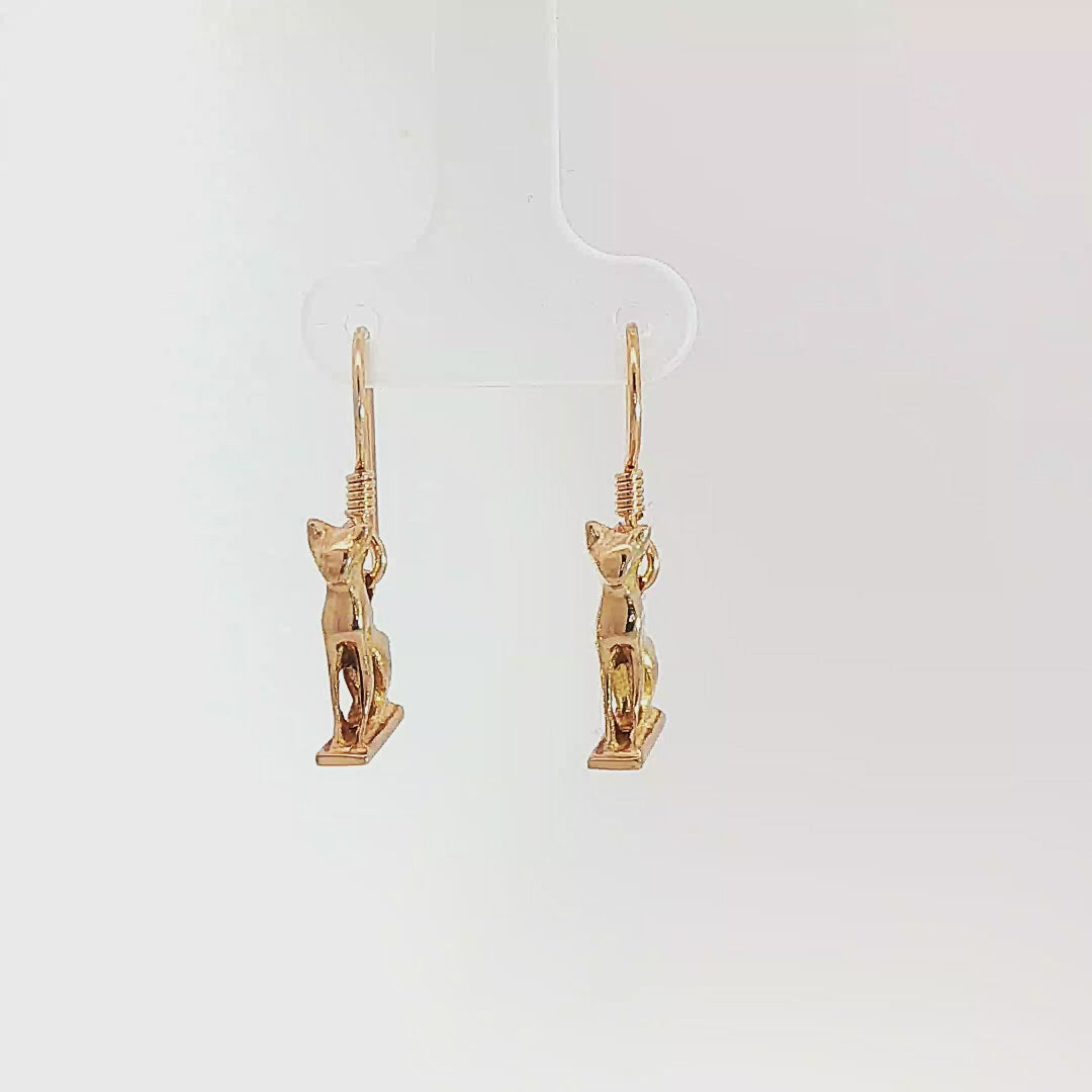 Handcrafted Bastet Cat Charm Earrings in antique bronze by Le Dragon Argenté. Inspired by the Egyptian goddess Bastet, symbol of protection, joy, and feminine strength. These detailed feline earrings are perfect for mythology lovers, cat enthusiasts, and fans of Egyptian-inspired jewelry with spiritual meaning.