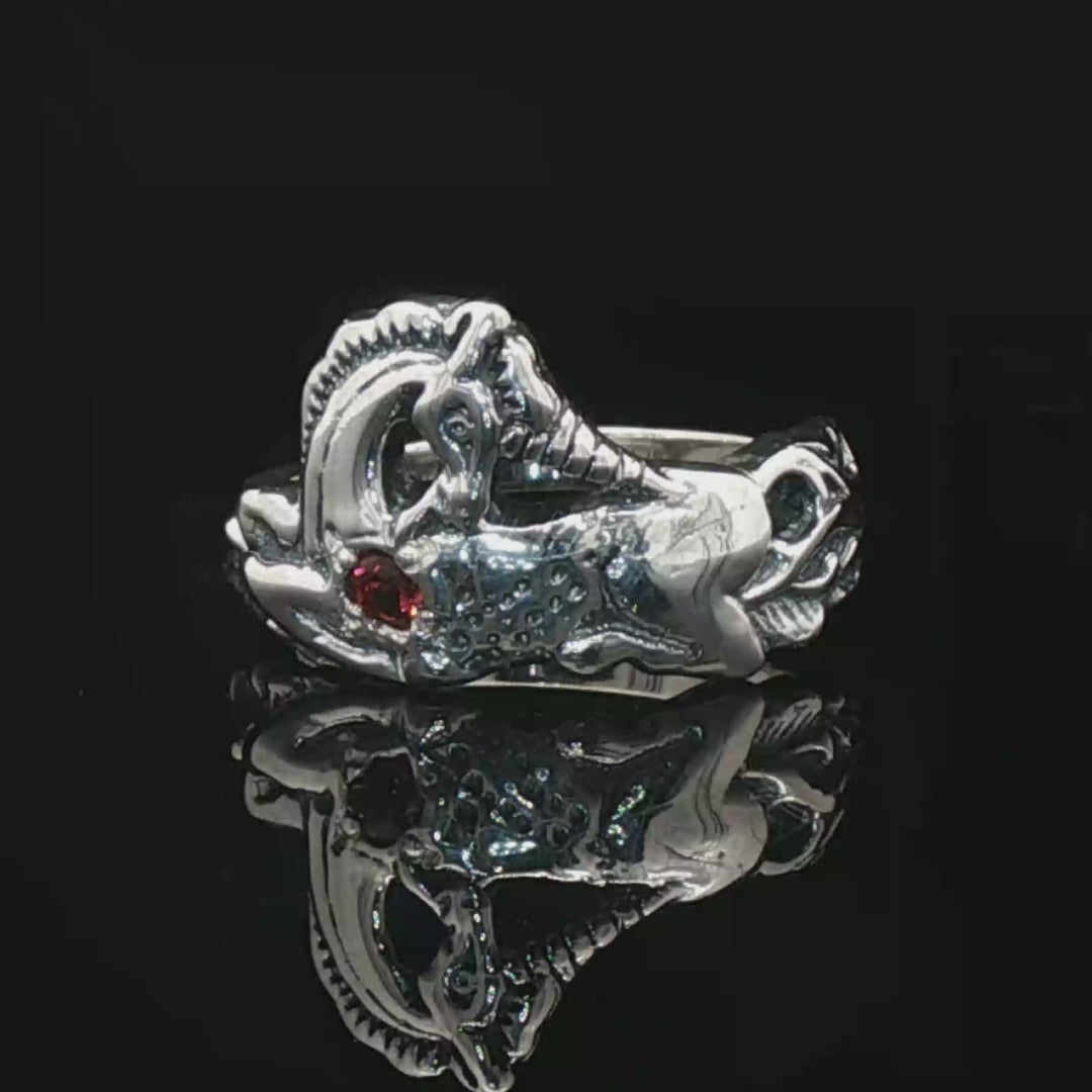 A detailed sterling silver unicorn ring with a vibrant gemstone heart, designed for lovers of unicorn jewelry and fantasy-inspired accessories by Le Dragon Argenté.