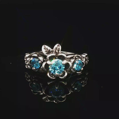 Triple rose birthstone ring in sterling silver with sparkling birthstones and detailed floral design in romantic vintage style by Le Dragon Argenté