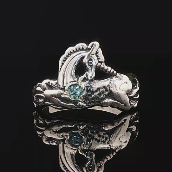 A detailed sterling silver unicorn ring accented with a colorful imitation birthstone heart, ideal for fans of unicorn jewelry and fantasy-inspired accessories by Le Dragon Argenté.