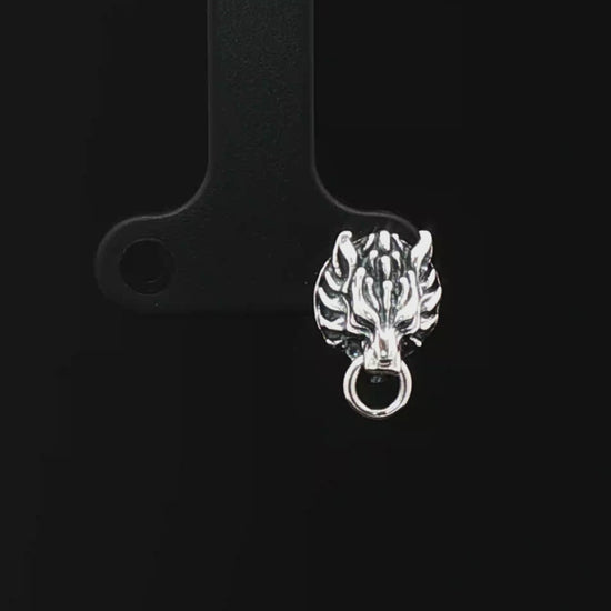 Handcrafted FF7 Fenrir stud earrings in sterling silver, inspired by Final Fantasy VII, featuring intricate wolf design for retro gamer fans and jewellery lovers alike.