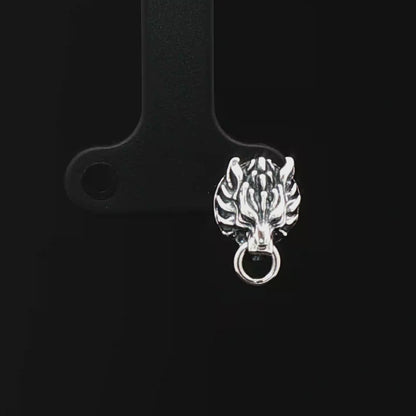 Handcrafted FF7 Fenrir stud earrings in sterling silver, inspired by Final Fantasy VII, featuring intricate wolf design for retro gamer fans and jewellery lovers alike.