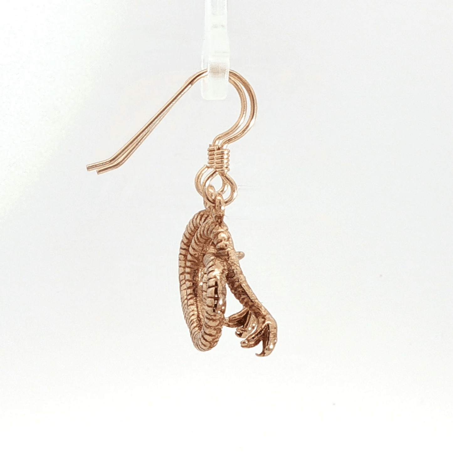 Antique bronze rattlesnake charm earrings, western gothic snake jewelry, small coiled serpent dangle earrings, desert inspired animal jewelry, edgy minimalist reptile earrings for everyday wear by Le Dragon Argenté